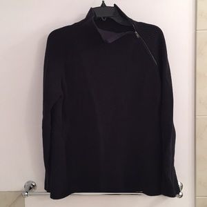 COS black sweater with side zipper